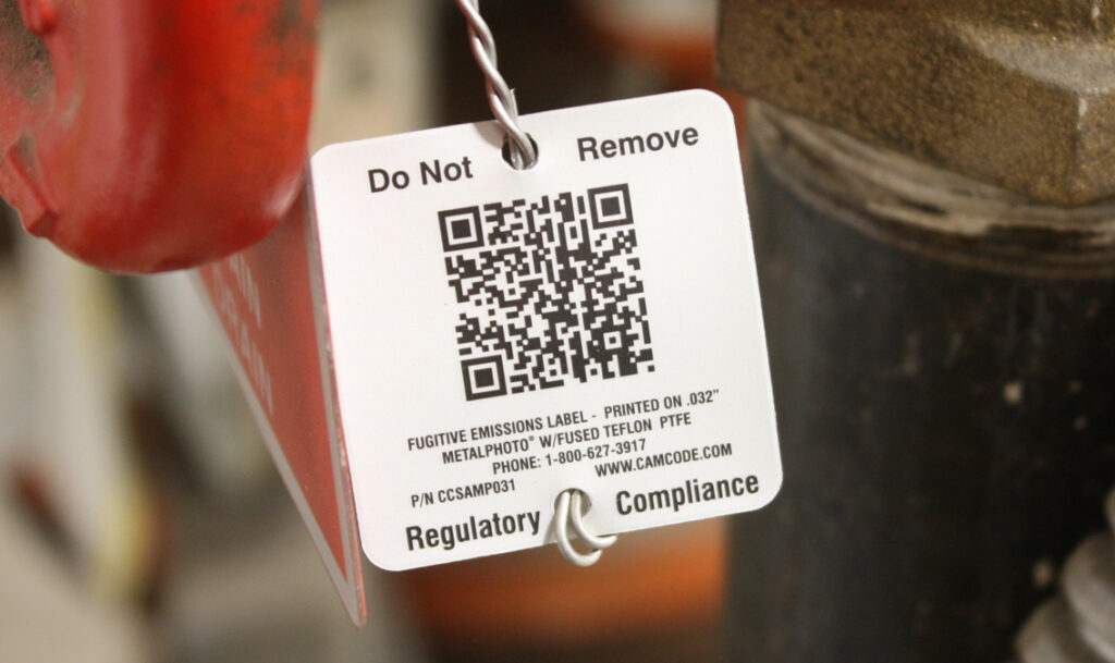 Compliance tag with a scannable QR code 