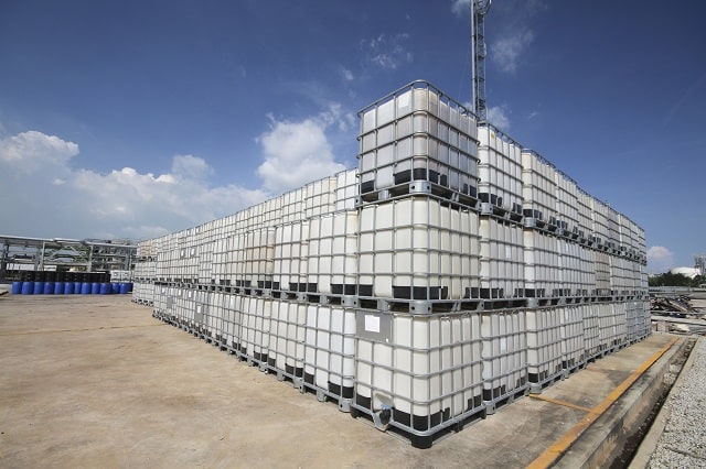 IBCs stored in stacks outdoors