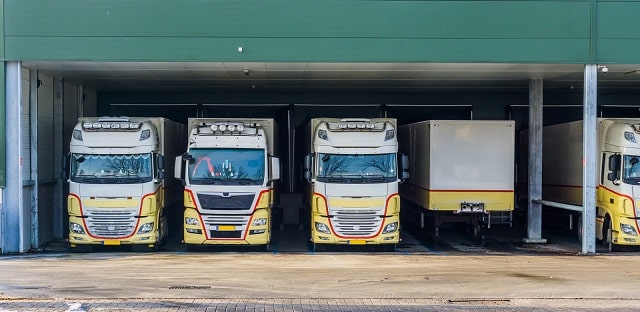 Tractor trailers in warehouse loading docks