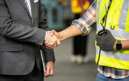 Shaking hands in a manufacturing facility