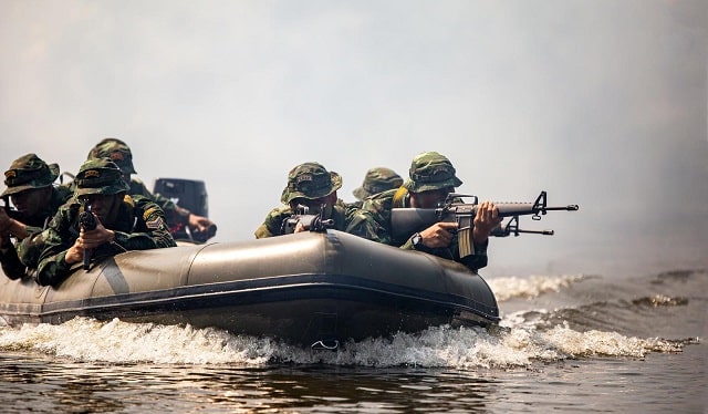 US soldiers on a raft 