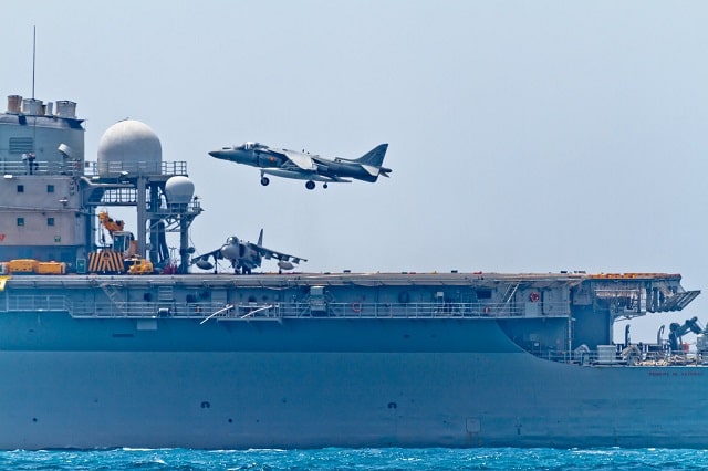 Aircraft landing on an aircraft carrier at sea