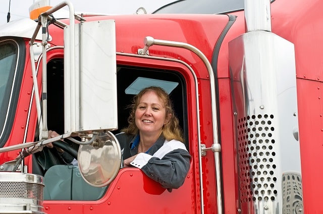 Woman driving a semi truck