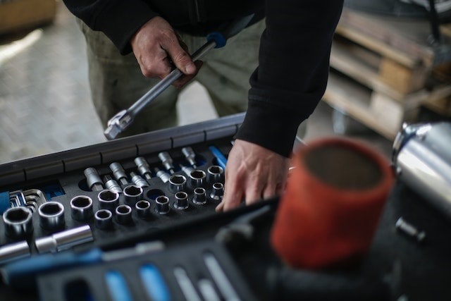 Person getting tools out of a toolbox