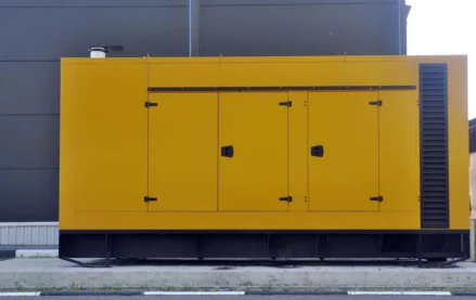 Industrial generator outside a building