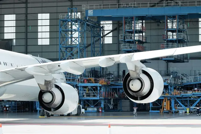 A passenger jet in a hanger