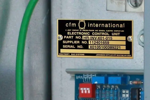 Brass nameplate on factory equipment