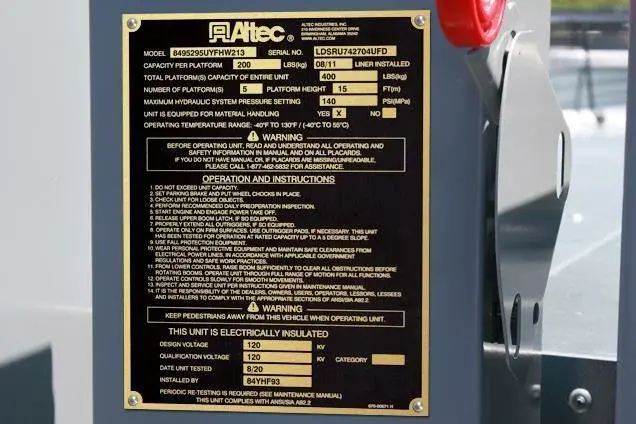 Brass nameplate on factory equipment